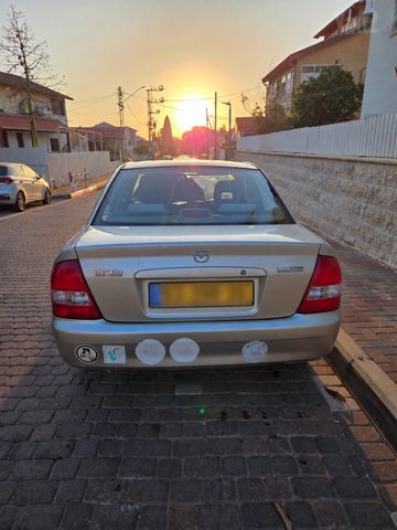 מודעת רכב מאזדה 323