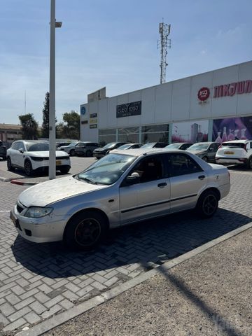 מודעת רכב מאזדה 323
