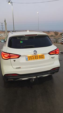מודעת רכב אם ג'י EHS PHEV