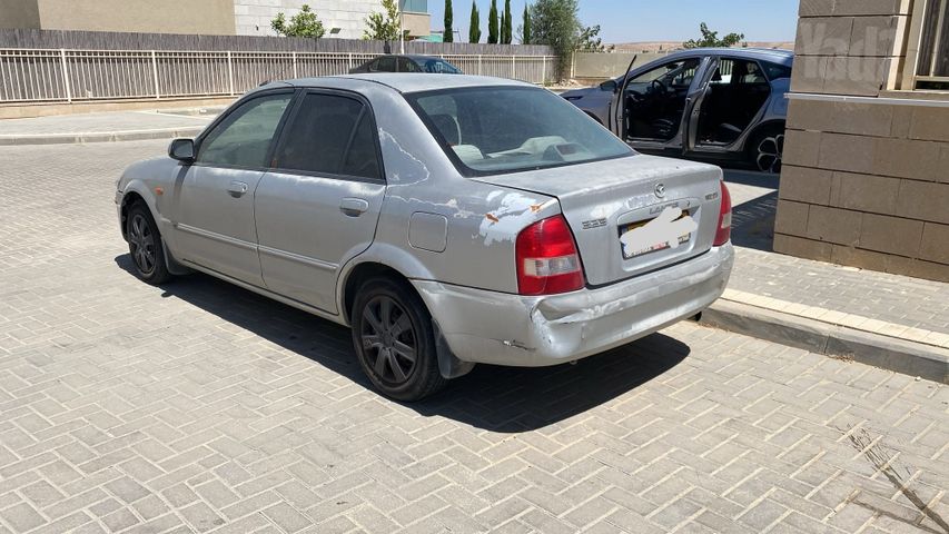 מודעת רכב מאזדה 323