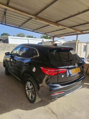 מודעת רכב אם ג'י EHS PHEV