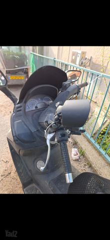 מודעת רכב סאן יאנג ג'וי-מקס 250