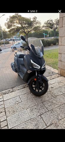 מודעת רכב סאן יאנג ג'וי-מקס Z-300