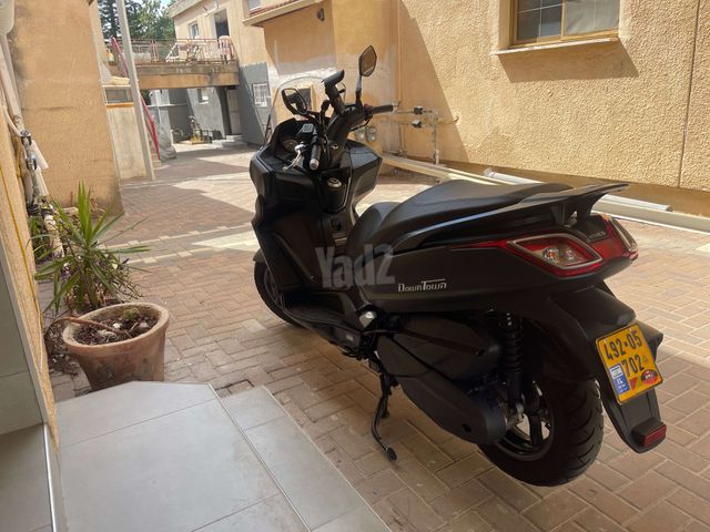 מודעת רכב קימקו דאון-טאון 250