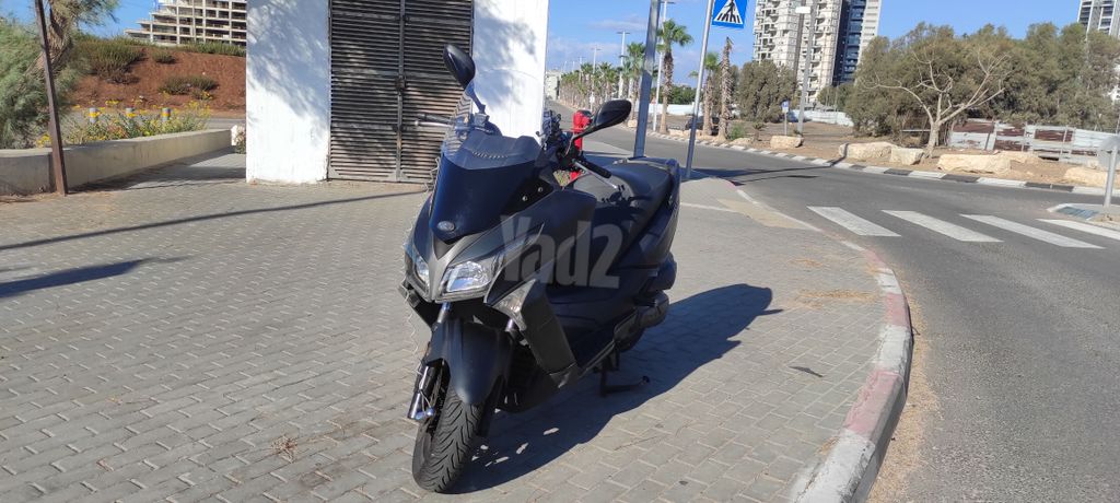 מודעת רכב קימקו איקס-טאון 125I