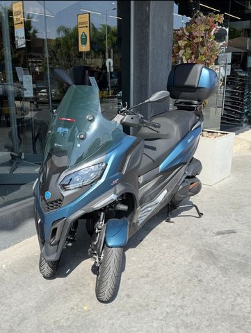מודעת רכב פיאג'ו MP3 500