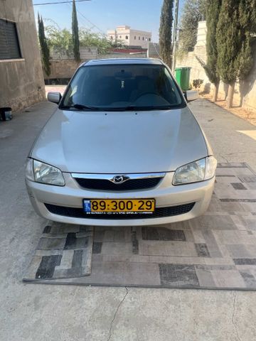 מודעת רכב מאזדה 323