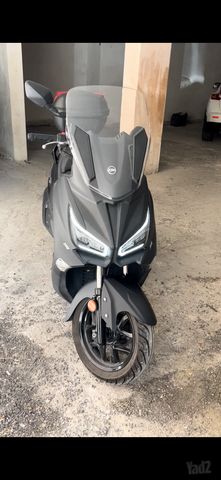 מודעת רכב סאן יאנג ג'וי-מקס Z-300