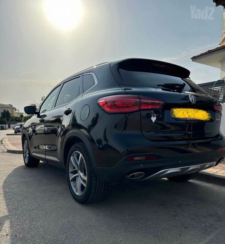 מודעת רכב אם ג'י EHS PHEV