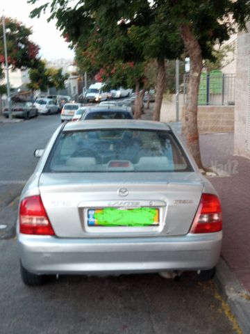 מודעת רכב מאזדה 323