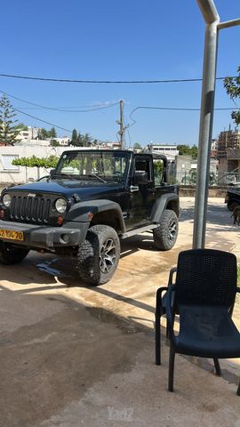 רנגלר Sport קצר אוט׳ פנאי-שטח 4 מק 3.8 (196 כ״ס)