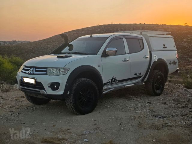 טרייטון / L200 4X4 Glx Esp אוט׳ 2.5 (136 כ״ס)